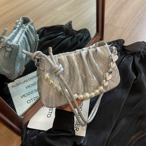 Elegant silver pleated cloud bucket bag with pearls and heart metal chain detail