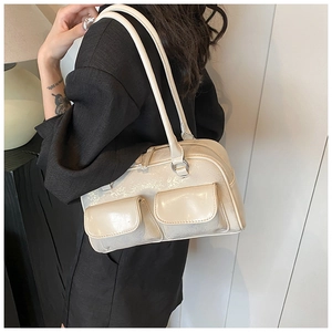 Chic cream white shoulder bag with metallic texture and double front pockets