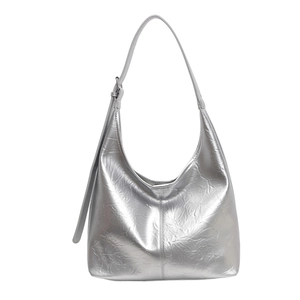 Silver metallic hobo bag with natural crinkle texture and adjustable shoulder strap