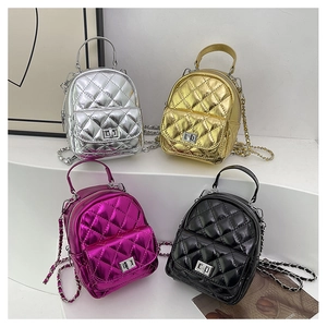 Four mini quilted backpacks in gold, silver, purple, and black with chain straps