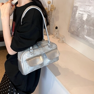 Chic silver Y2K shoulder bag with distressed oil wax leather and dual front utility pockets