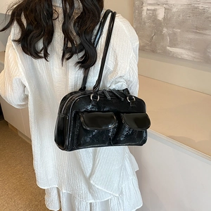 Retro black glossy patent leather shoulder bag with front pockets and long straps
