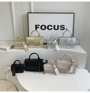 Detailed comparison of four woven textured handbags in different sizes and colors