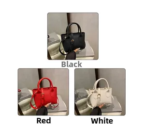 Detailed close-up showing texture and design of mini tote bag in black, red, and white
