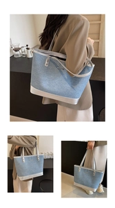 Detail of light blue denim tote with silver metallic leather trim and strap accents