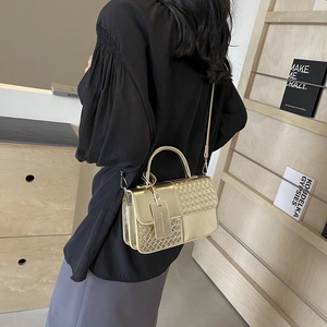 Elegant gold woven texture crossbody bag for women with circular top handle and strap