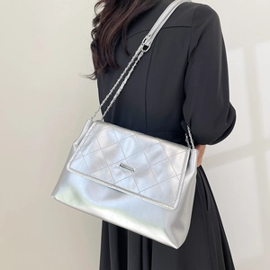 Silver quilted chain bag with diamond stitching and rectangular flap design for women