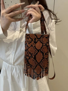 Summer 2025 trendy snakeskin small square bag with fringe details and crossbody strap