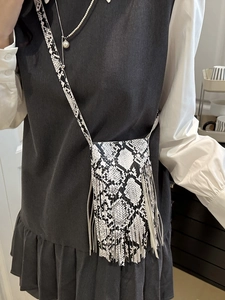 Chic snake print crossbody bag with long tassels and slim shoulder strap for women