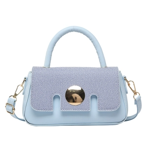 Light blue square handbag with weave texture, gold buckle and adjustable strap