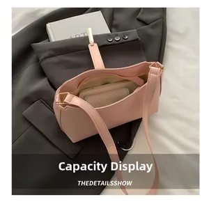 Pink retro shoulder bag capacity display showing phone and card holder inside