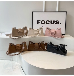 Detailed display of crocodile pattern crossbody bags in six vibrant colors on white steps