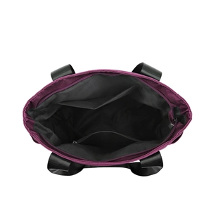Large capacity purple nylon tote bag interior with multiple organizational pockets