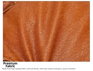 Close-up of brown washed leather fabric with soft lychee texture and rivet detailing