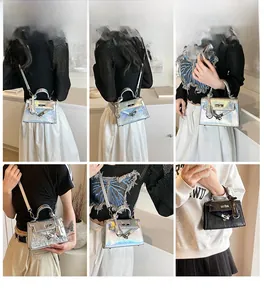 Detailed views of mini Kelly bags in silver laser and black texture on model