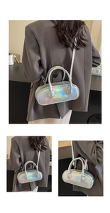 Detail of silver laser leather bowling bag showing iridescent finish and adjustable strap