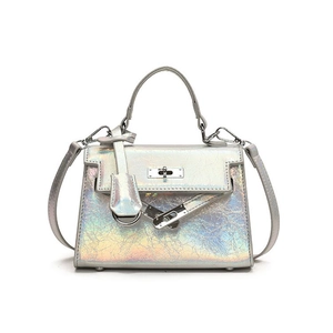 Chic holographic silver trapezoid handbag with iridescent crackle finish and top handle