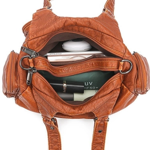 Brown vintage washed leather tote bag with large capacity pockets and interior storage
