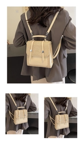 Detail of minimalist cream woven backpack showing straw texture and leather flap with buckle
