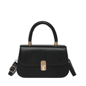 Chic black matte leather tote with gold buckle and adjustable strap for women