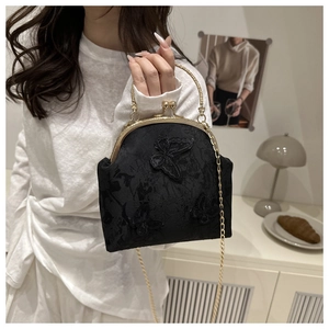 Retro black fabric frame bag featuring 3D butterfly embroidery and gold chain strap