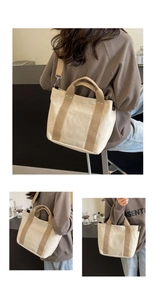 Dettaglio borsa tote in tela con spalline kaki, tasca frontale e tracolla regolabile
