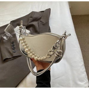 Silver crescent underarm bag with double pearl and heart chains for chic commute