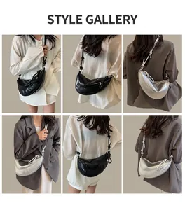 Detail showing chic crescent crossbody bags with knotted strap in black and silver finishes