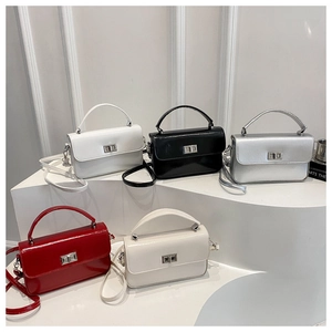 Five assorted glossy leather mini square bags with silver metallic twist locks in multi-colors