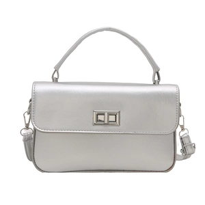 Minimalist silver metallic leather square handbag with top handle and crossbody strap