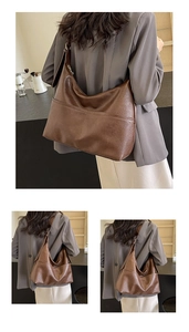 Detailed view of dark brown PU leather hobo bag with smooth texture and sturdy zipper
