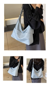 Three views of a light blue Hobo bag showing large capacity and adjustable strap detail