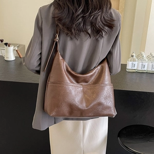 Large dark brown shoulder tote bag in oil-wax finish for chic urban style commute