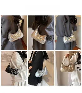 Detailed quilted hobo bags in silver, black, and gold with heart chain straps