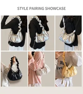 Detail view of cloud dumpling bag with ruffled strap in four colors on model
