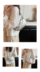 Detailed views of a silver crescent bag with pearl heart chain and slim strap