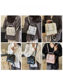 Detail view of multi-way mini backpack in silver, black and pink faux leather