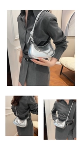 Detailed views of a silver metallic crescent bag with knotted strap and chain accents