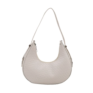 White crocodile pattern crescent hobo bag with silver hardware and shoulder strap