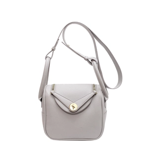Sac seau chic en cuir violet clair avec détails dorés et bandoulière réglable