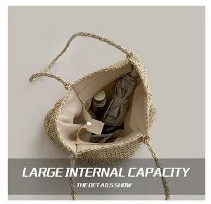 Interior view of large beige straw tote bag showing ample space for daily essentials