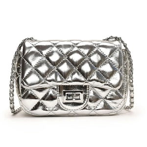 Silver quilted crossbody bag with metallic finish and chain strap on white background