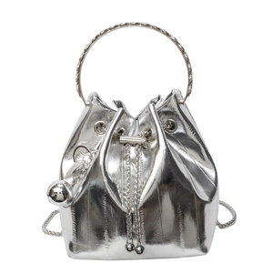 Chic silver metallic drawstring bucket bag with round metal handle and chain strap