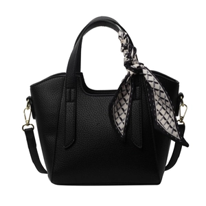 Black pebble leather bucket bag with geometric silk scarf handle and gold hardware
