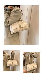 Detail view of cream patent leather handbag featuring dual front flap pockets and slim straps