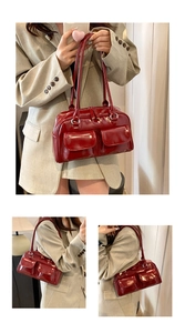 Detailed view of glossy dark red patent leather shoulder bag with dual front pockets