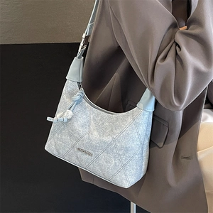 Light blue quilted leather baguette bag with knotted pearl details and metal logo