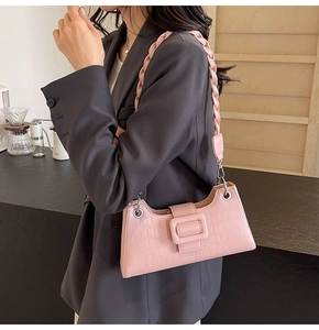 Pink crocodile pattern baguette bag with stylish woven shoulder strap and square buckle