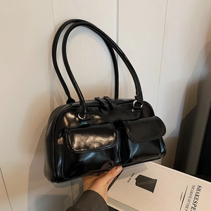 Glossy black leather underarm bag with double front pockets and long handles for women