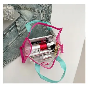Ruime transparante PVC en mesh handtas met interne opslag voor diverse cosmetica